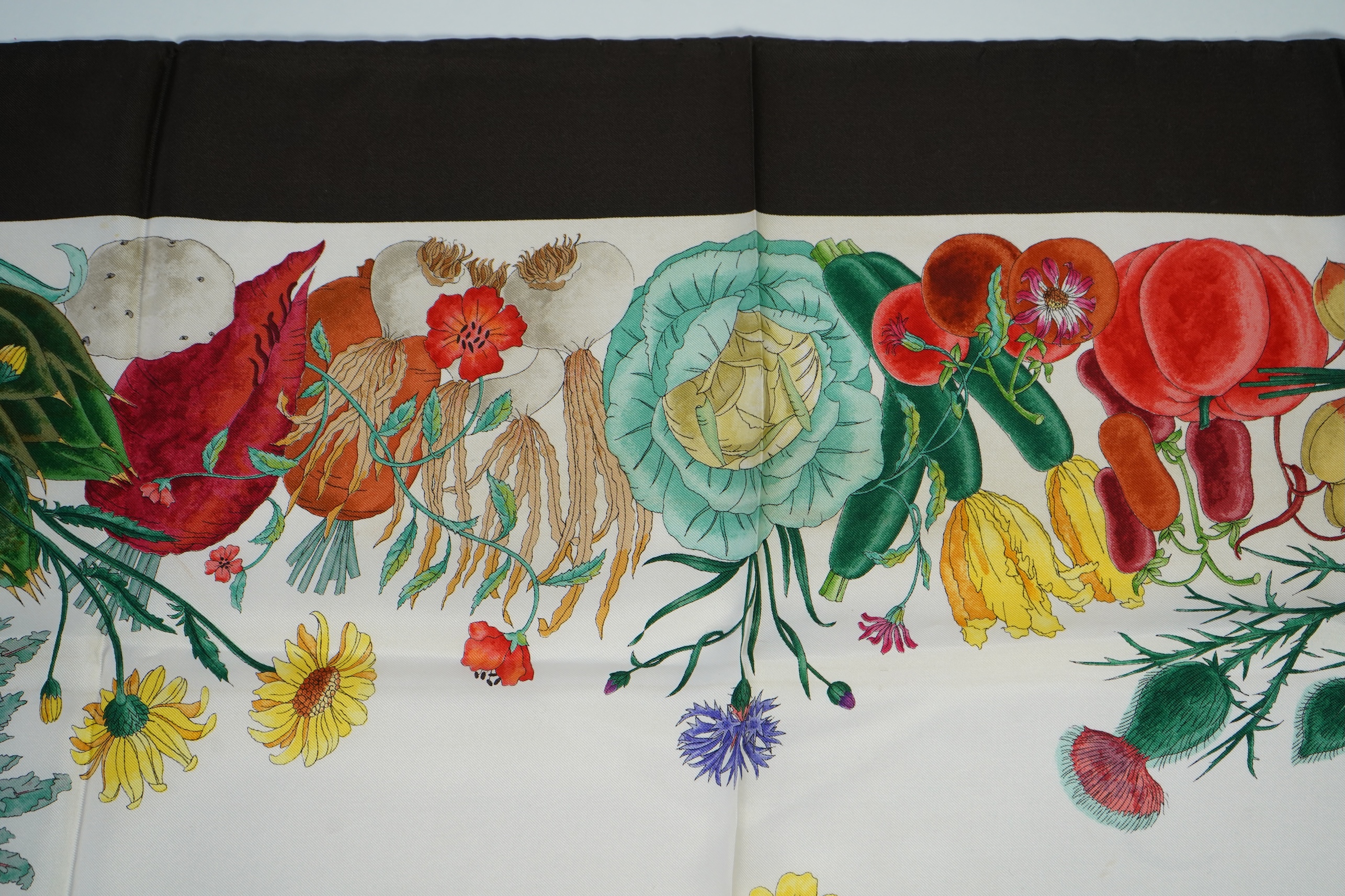 A Gucci vegetable garden design silk scarf by Vittorio Accornero, 87 x 86cm